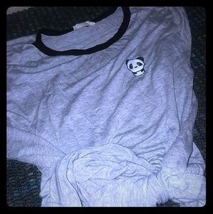 A grey shirt with a panda on it!